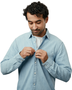 Picture of guy buttoning up shirt with white text overlay that reads "your next steps".
